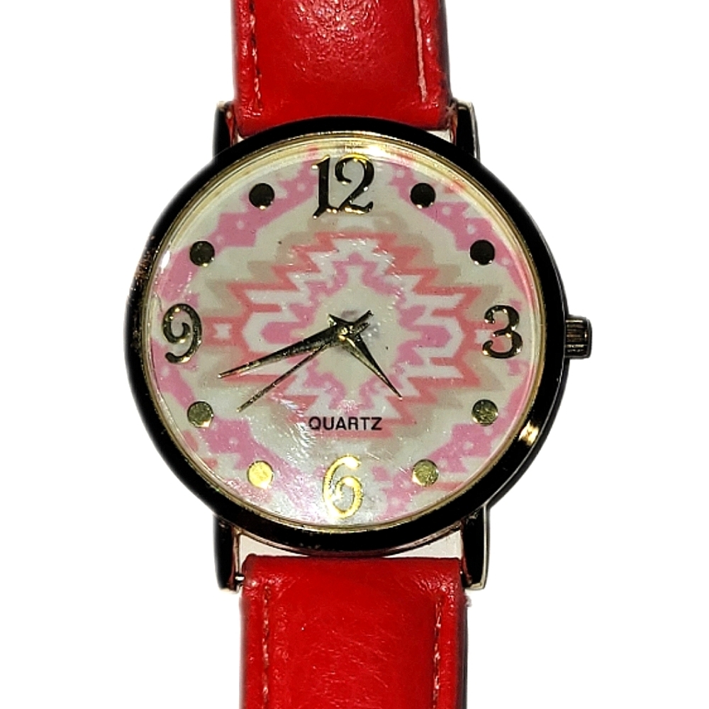 Pink Quartz Watch With Pink And Gray Patterned Face